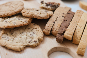 Cookies and biscotti on a wooden board