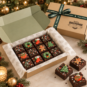 Christmas brownie gift box with festive brownies, branded tissue paper, and custom holiday ribbon