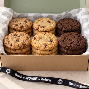 Close-up of three cookie varieties stacked inside Ruth’s Build Your Own Cookie Box