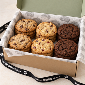 Ruth’s Build Your Own Cookie Box with three cookie varieties in a kraft gift box with branded tissue and ribbon