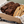 Close-up of chocolate chunk brownies, chocolate cookies and almond biscotti in Ruth’s large gift box