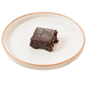 Close-up of Ruth’s Original Extra Fudgy brownies with rich chocolate texture