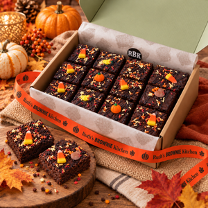 Thanksgiving brownie gift box with festive brownies, fall ribbon, and Ruth’s Brownie Kitchen packaging